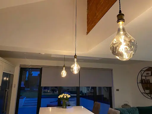 A living room with a couch and a table.